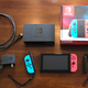 In the box: The Switch, two Joy-Con (multicolored or grey), a dock, two Joy-Con caps, a Joy-Con grip, an AC adapter, and an HDMI cable.